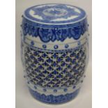 Chinese porcelain garden seat decorated in underglaze blue with reticulated sides, 48cm high