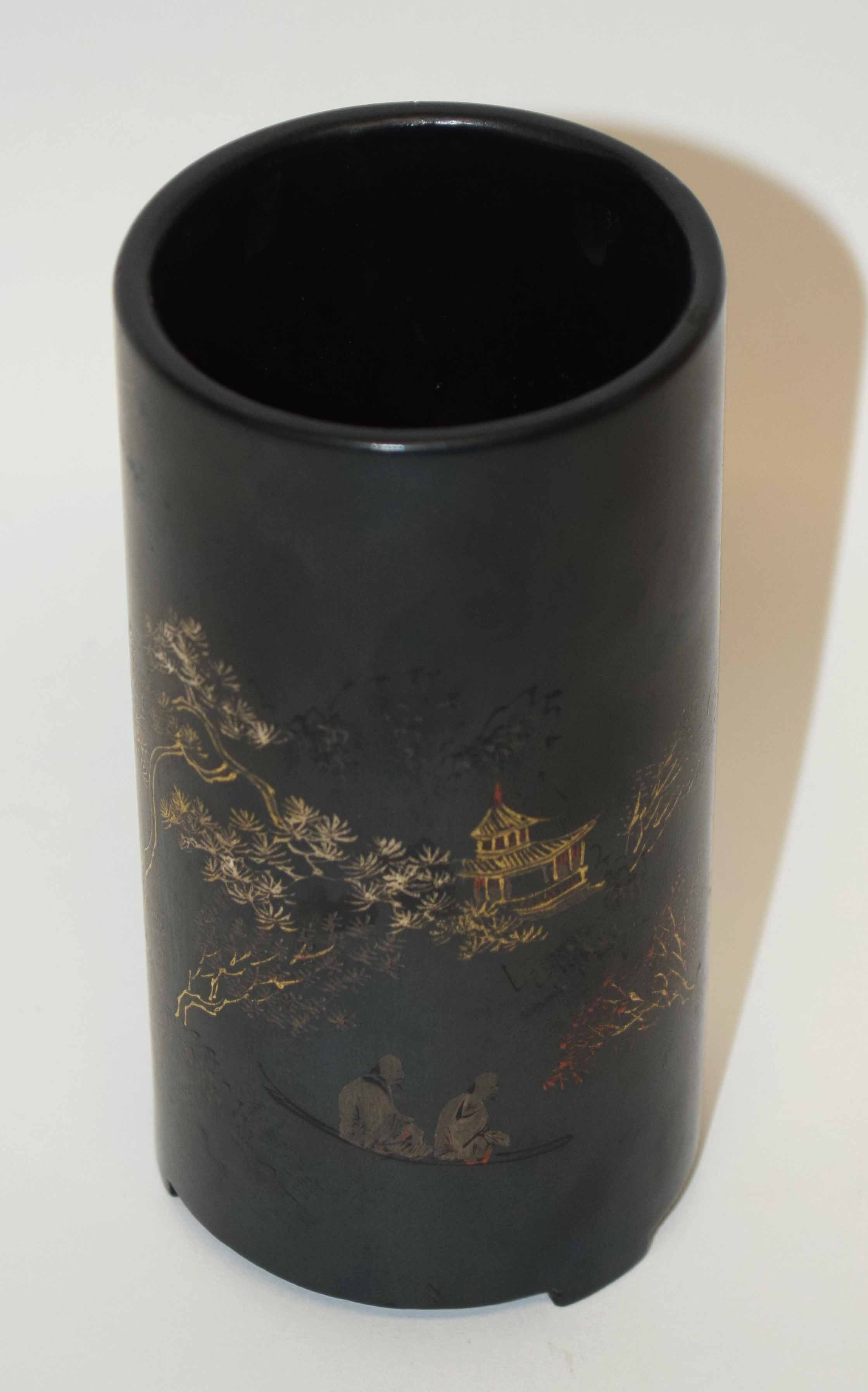 Unusual Oriental lacquer vase with gilt and iron red decoration of two figures in a boat with pagoda