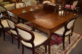 Georgian style mahogany D-end dining table with single centre leaf and brass clips, raised on