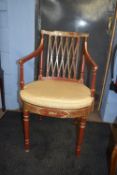 Early to mid 19th century armchair raised on ring turned legs with painted decoration throughout,