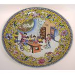 Modern Chinese porcelain charger with polychrome decoration of Chinese ladies to centre,