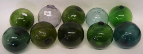Ten glass balls, eight coloured green, two clear (10)