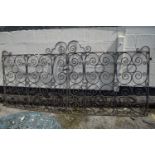 PAIR OF DECORATIVE WROUGHT IRON GATES