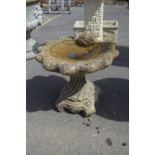 DECORATIVE COMPOSITION BIRD BATH FORMED AS A SHELL ON AN ORNATE PLINTH