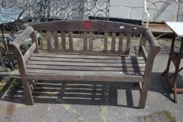 WOODEN GARDEN BENCH, CARVED IN THE SHAPE OF A ROSE TO BACK