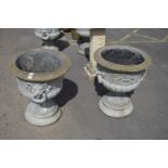 PAIR OF LARGE MOULDED COMPOSITION URNS WITH LION HEADS AND SCROLL WORK DECORATION