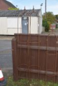 PAIR OF LARGE GARDEN OBELISKS WITH FLEUR DE LYS FINIALS