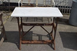 CAST SINGER SEWING MACHINE TABLE WITH LATER MARBLE TOP