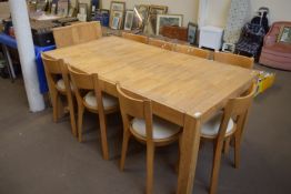 LARGE MODERN DINING TABLE WITH CENTRAL LEAF, TOGETHER WITH SET OF EIGHT ASSOCIATED CHAIRS IN CREAM