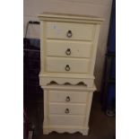 PAIR OF PAINTED RING HANDLED BEDSIDE THREE DRAWER CABINETS, 58CM HIGH