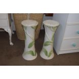 PAIR OF WHITE AND GREEN CERAMIC PLANT STANDS, 50CM HIGH