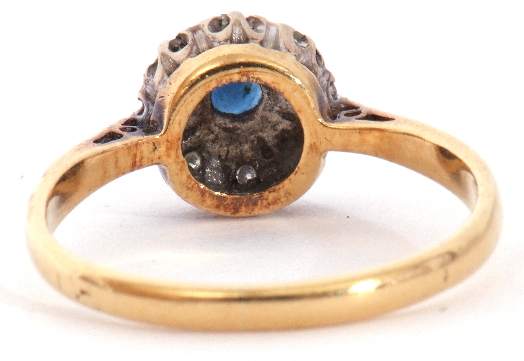 Sapphire and diamond cluster ring, the round faceted cut sapphire raised above a small diamond - Image 4 of 6