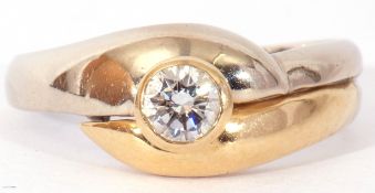 18ct gold brilliant cut solitaire diamond ring, the bezel set diamond raised above two-tone cross