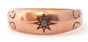 Antique 9ct gold small diamond ring, centring a small single cut diamond in a star engraved
