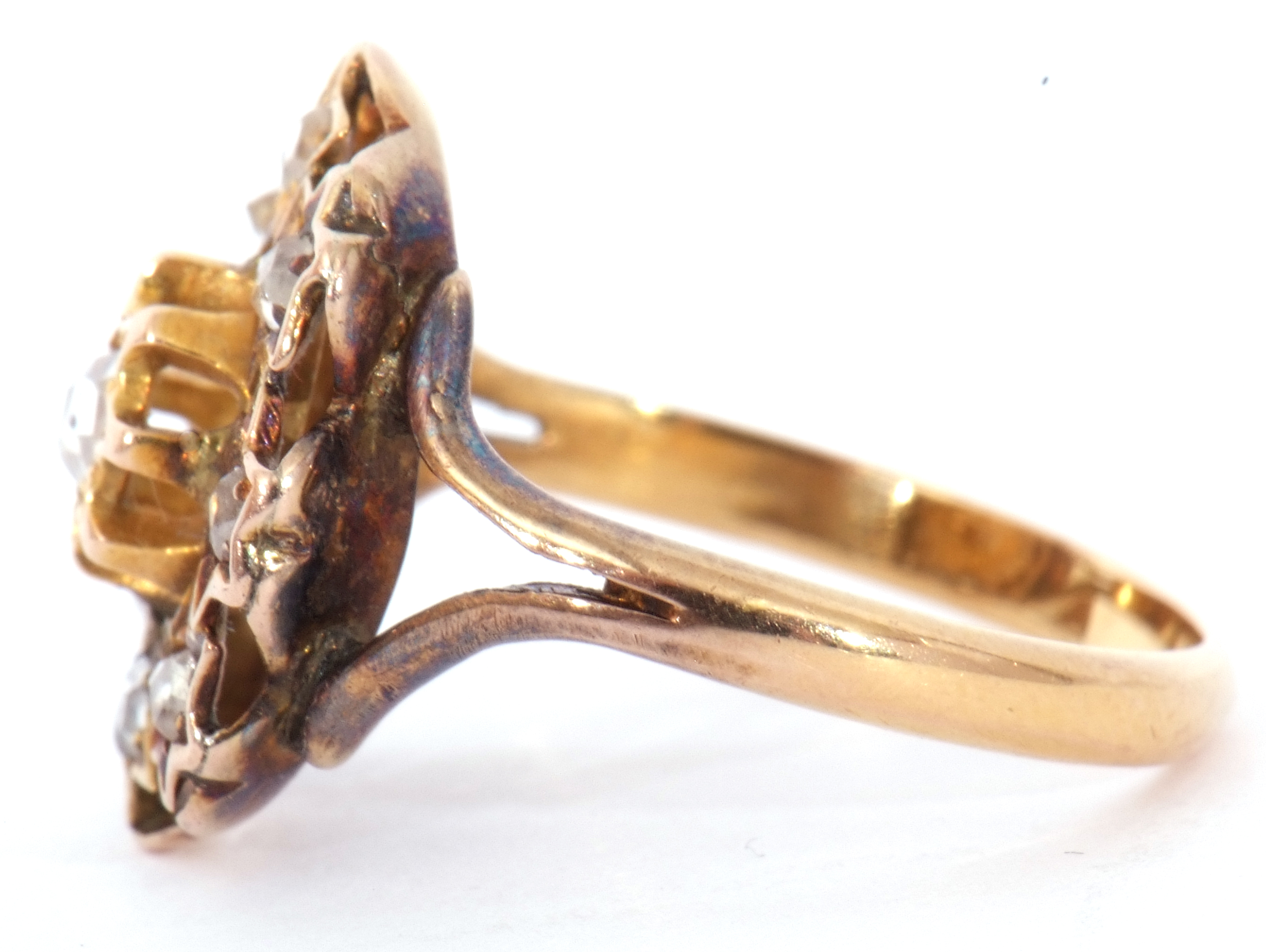 Unmarked yellow metal diamond ring, featuring 10 rose cut diamonds, each claw set in a star engraved - Image 2 of 7