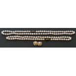 Mixed Lot: two cultured pearl necklaces, both a single row design, with uniform shaped beads, 4mm