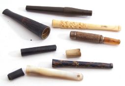 Mixed Lot: comprising an early 20th century cased Dunhill cigarette holder of sliding form with