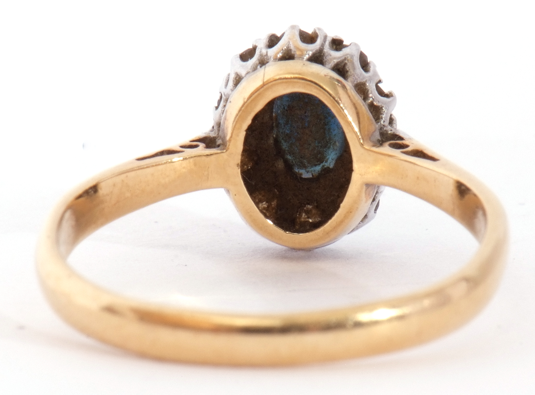 Sapphire and diamond cluster ring, the oval shaped faceted sapphire raised above a small diamond - Image 4 of 8