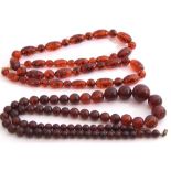 Mixed Lot: two long lengths of amber type beads (2)