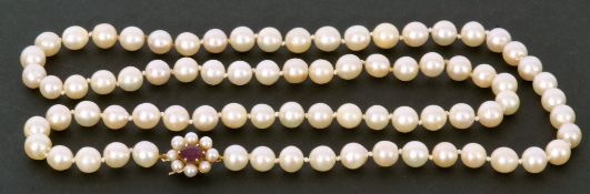 Single row of cultured pearls of uniform shape (7.5mm approx) to a 9ct gold amethyst and seed