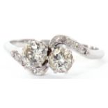 Diamond cross over ring featuring two brilliant cut diamonds, total ct wt 0.80 approx, shoulders