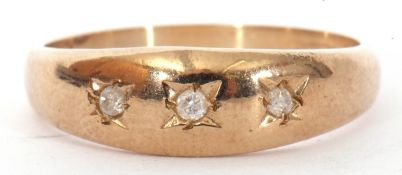 9ct gold and diamond gipsy style ring featuring three small diamonds, each in star engraved