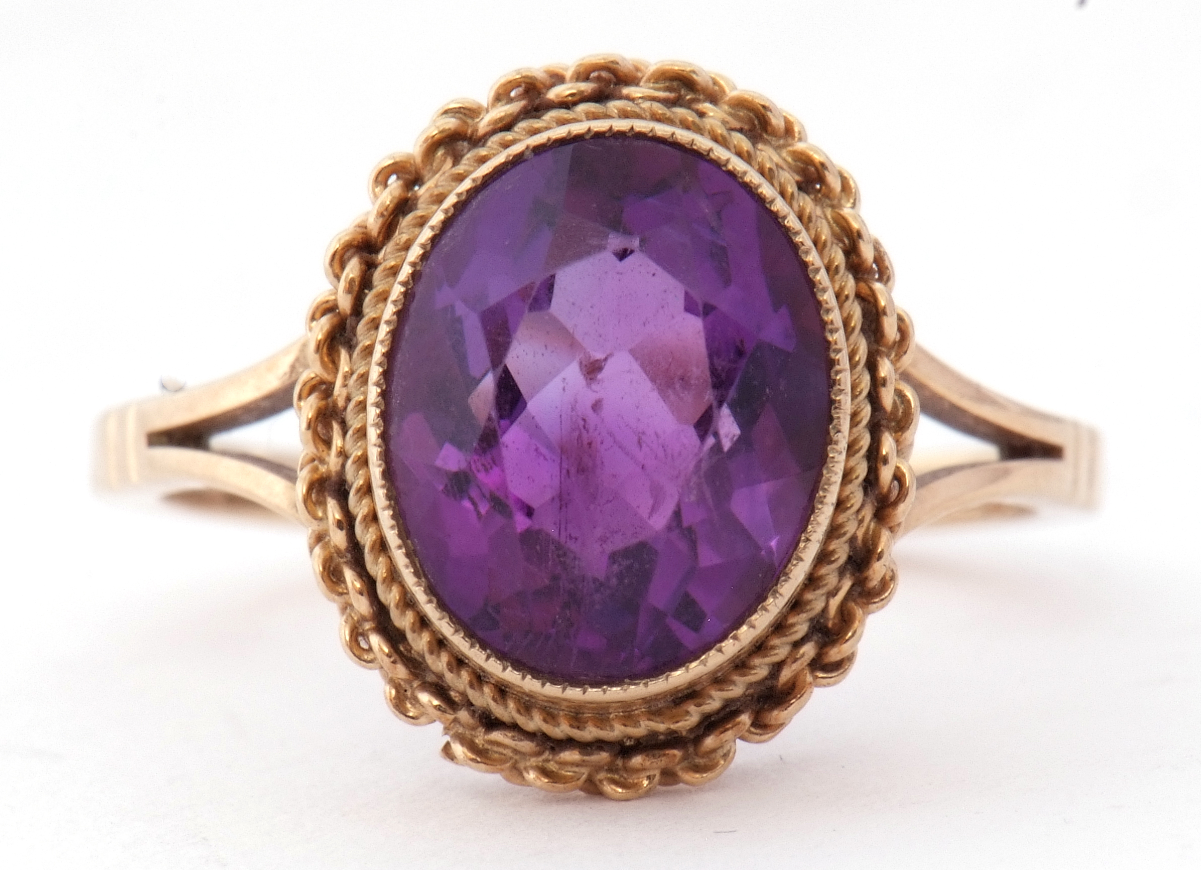 Modern 9ct gold and amethyst ring, the oval faceted amethyst bezel and milliegrain set with a rope - Image 8 of 8