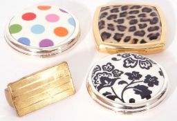 Mixed Lot: three modern Stratton compacts, together with a vintage Stratton folding lipstick and