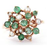 9ct gold emerald and seed pearl cluster ring, a large flowerhead design featuring 10 small round cut