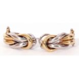 Pair of modern two-tone 9ct gold stylised earrings, 2cm long, with clip and post fittings, 6.6gms