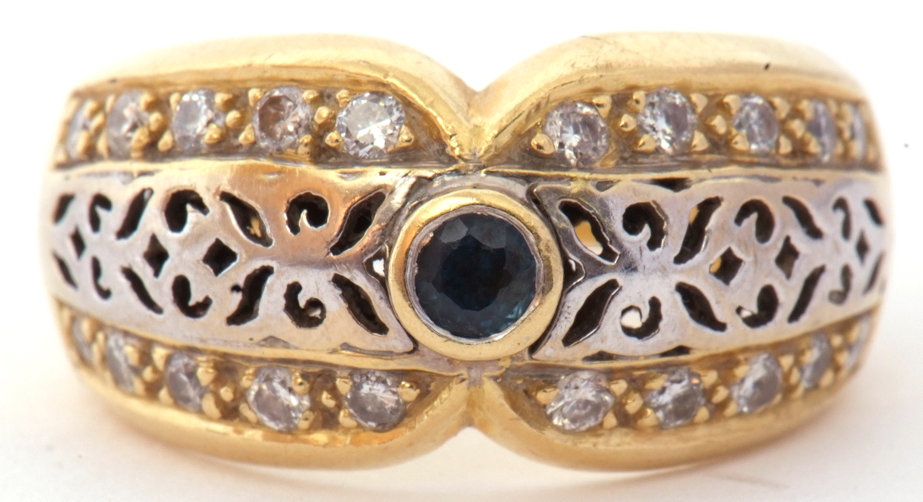 Two-tone yellow metal filigree fronted design ring, centring a small sapphire and highlighted with - Image 2 of 8