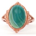 Modern 9ct gold and green quartz ring, centring a cabochon green quartz stone raised in a bezel