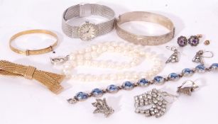 Mixed Lot: a ladies Ormo wrist watch, a hallmarked silver part engraved hinged bracelet,