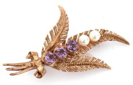 9ct gold amethyst and seed pearl spray brooch, featuring three round faceted amethysts and two small
