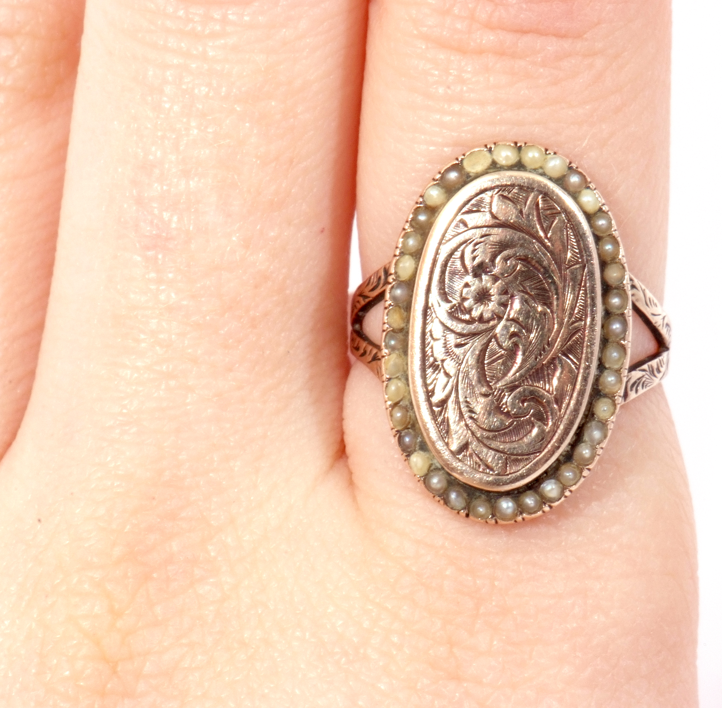 Antique yellow metal and pearl set ring, the oval panel engraved and chased with flowers and - Image 8 of 8