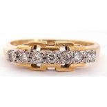 18ct gold seven stone diamond ring, line set with seven small round brilliant cut diamonds, each