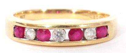 Modern ruby and diamond ring, an alternate design featuring four round cut faceted rubies and