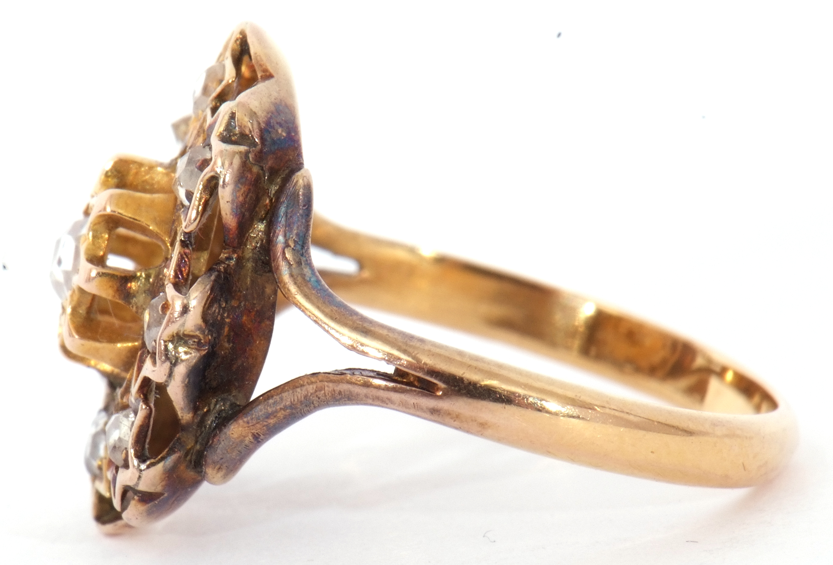 Unmarked yellow metal diamond ring, featuring 10 rose cut diamonds, each claw set in a star engraved - Image 3 of 7