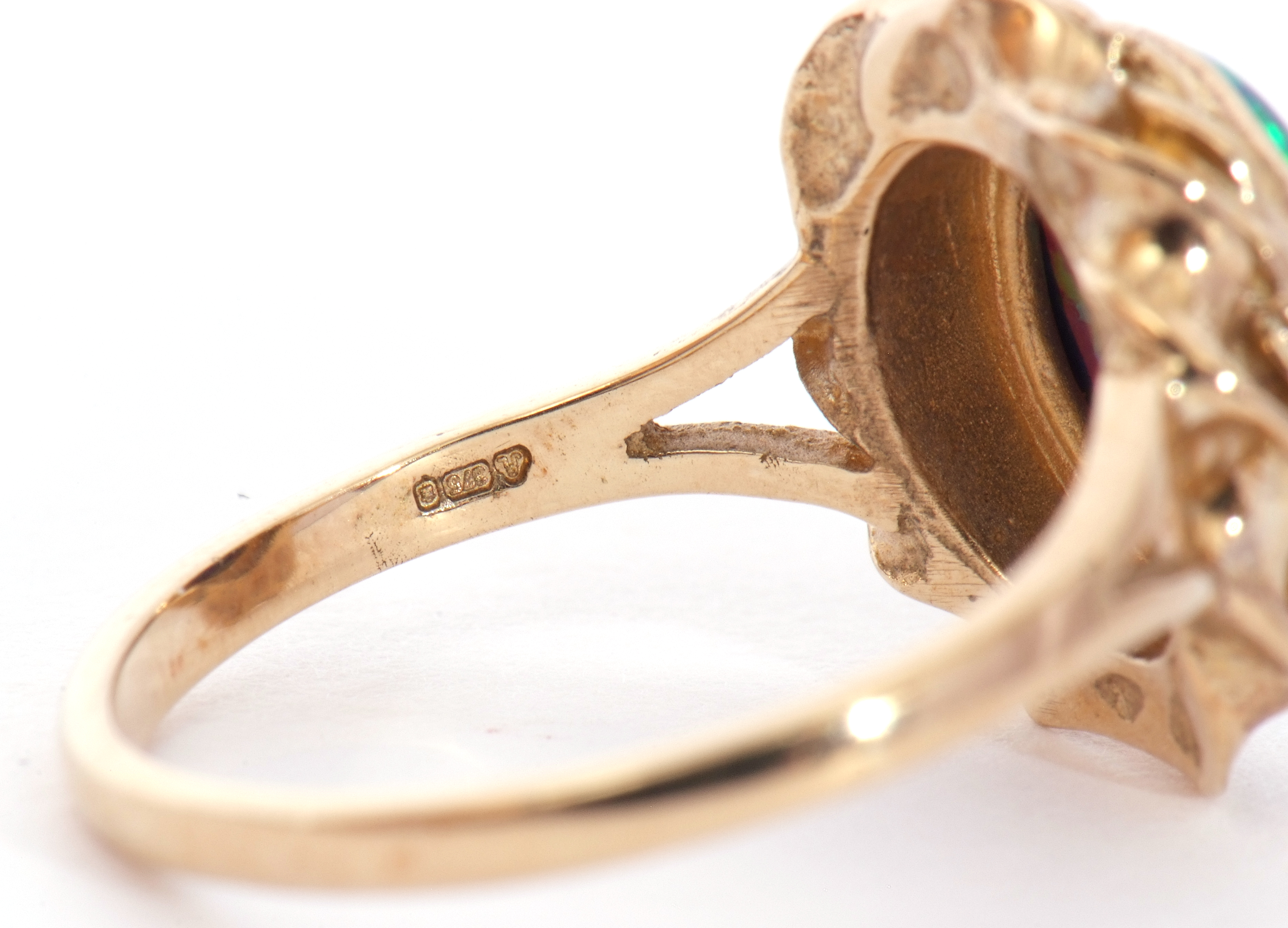 Modern 9ct gold and opalescent ring, the oval cabochon bezel set in a rope twist and pierced - Image 7 of 8