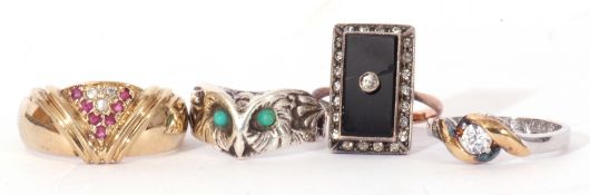 Mixed Lot: four white metal dress rings to include one featuring an owl's head and three paste set