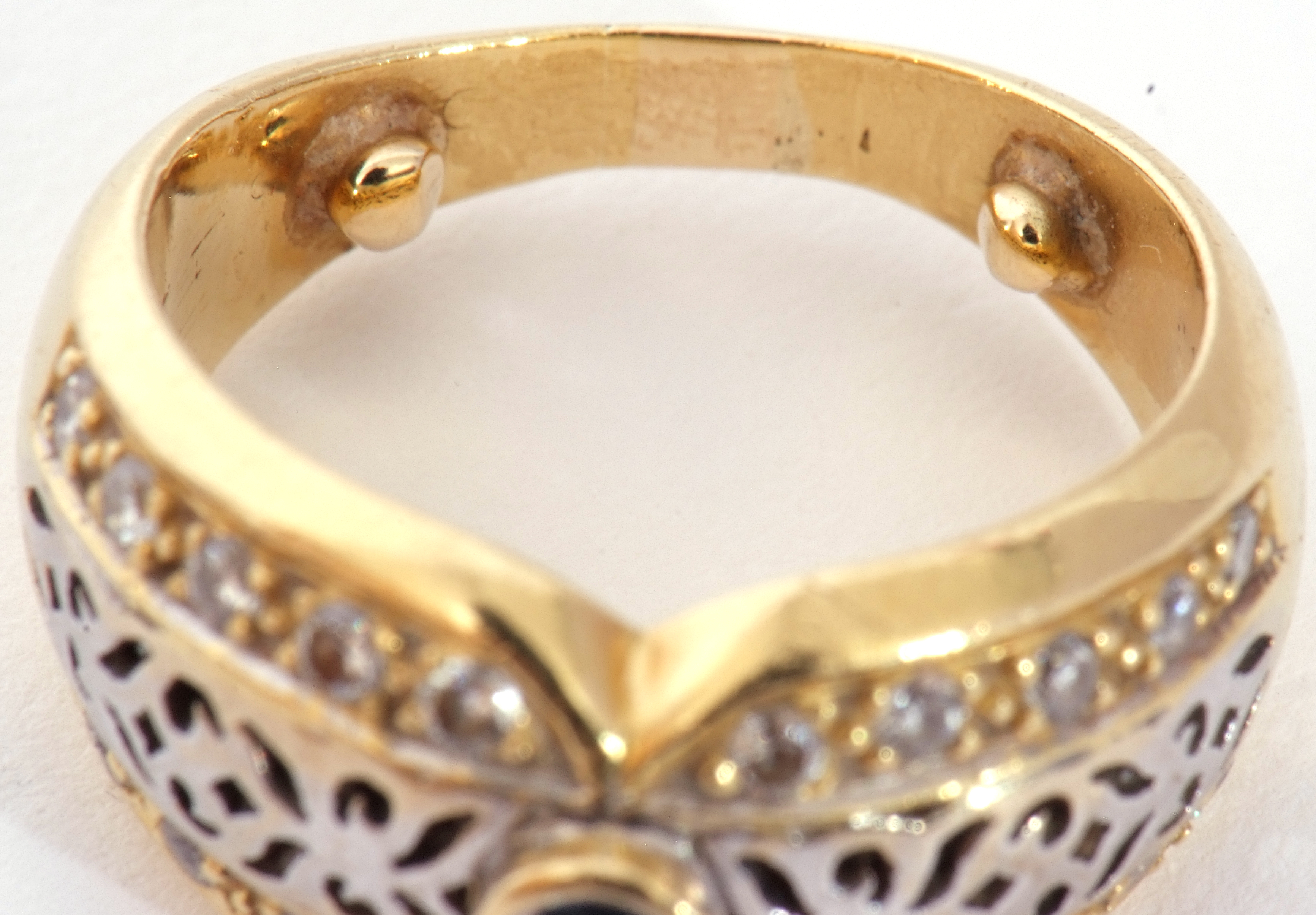 Two-tone yellow metal filigree fronted design ring, centring a small sapphire and highlighted with - Image 8 of 8
