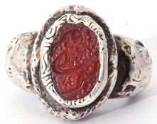 Modern large white metal cast ring featuring an oval engraved carnelian panel in rub-over setting,