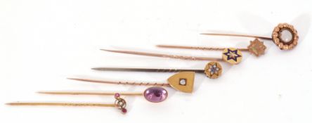 Mixed Lot: seven various stick pins to include a Victorian shield, an old cut diamond set pin, a 14k