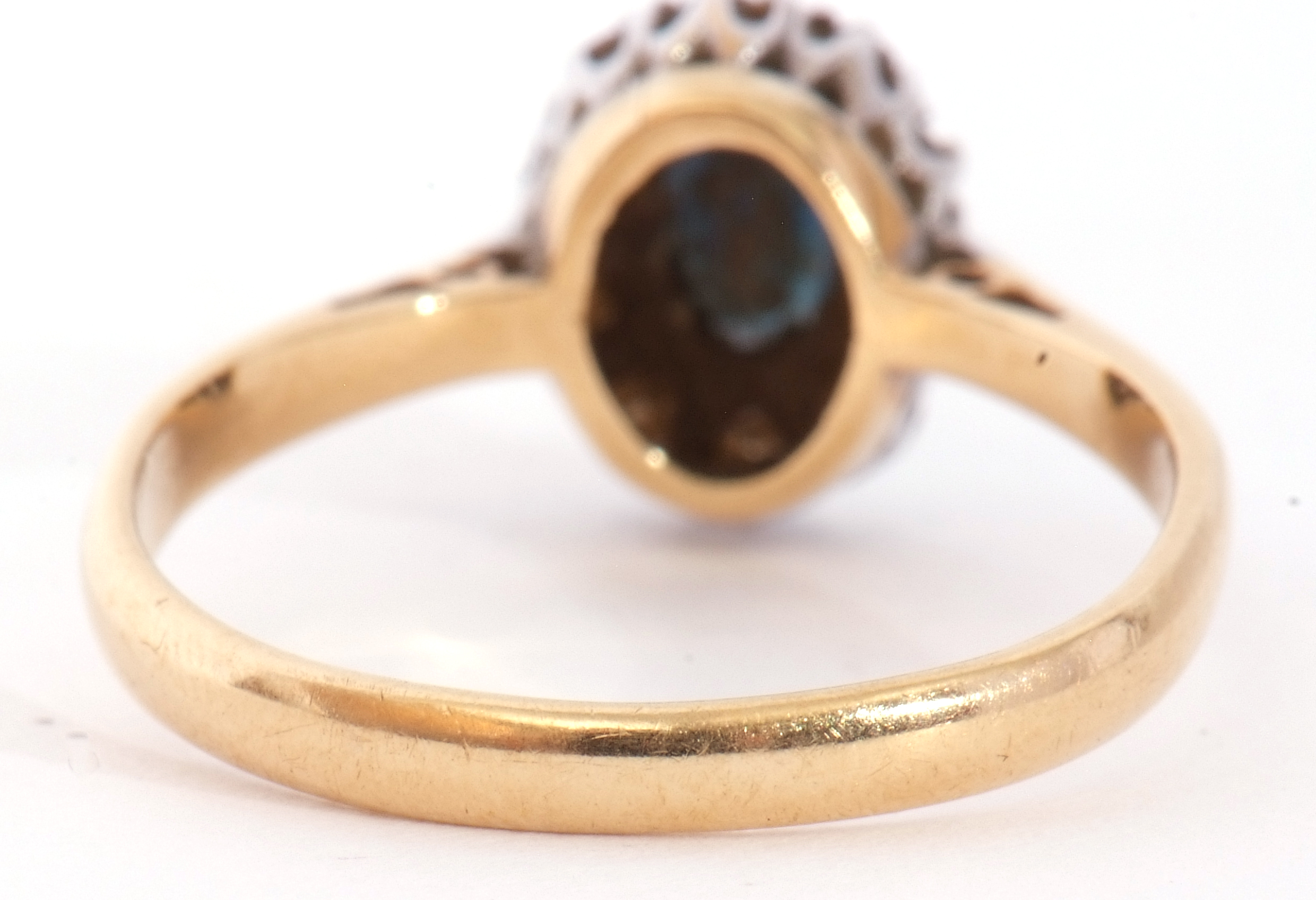 Sapphire and diamond cluster ring, the oval shaped faceted sapphire raised above a small diamond - Image 5 of 8