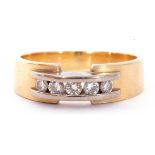 Unmarked yellow metal two-tone diamond ring featuring five channel set round brilliant cut diamonds,