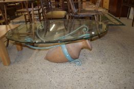 UNUSUAL OVAL GLASS COFFEE TABLE WITH AN AMPHORA BASE, APPROX 120 X 80CM