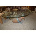 UNUSUAL OVAL GLASS COFFEE TABLE WITH AN AMPHORA BASE, APPROX 120 X 80CM