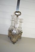 ** WITHDRAWN ** METAL TANTALUS WITH FOUR CUT GLASS DECANTERS