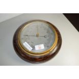 BAROMETER IN CIRCULAR OAK FRAME AND A FURTHER SMALL TEMPERATURE GAUGE IN CIRCULAR WOODEN FRAME