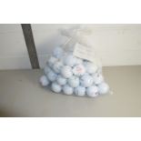 FIFTY GOLF BALLS IN GOOD CONDITION